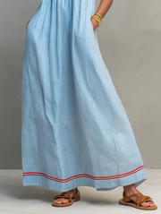 Loredana | Vestito lungo minimalista a righe da donna con bordo rosso e spalline sottili