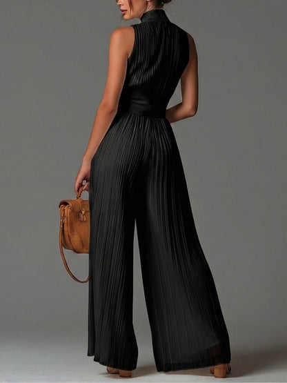 Vittoria | Tuta nera in chiffon con scollo a V, senza maniche, con zip, a pieghe, pantaloni a palazzo