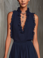 Serafina | Tuta blu navy con volant, plissettata, in pizzo di chiffon