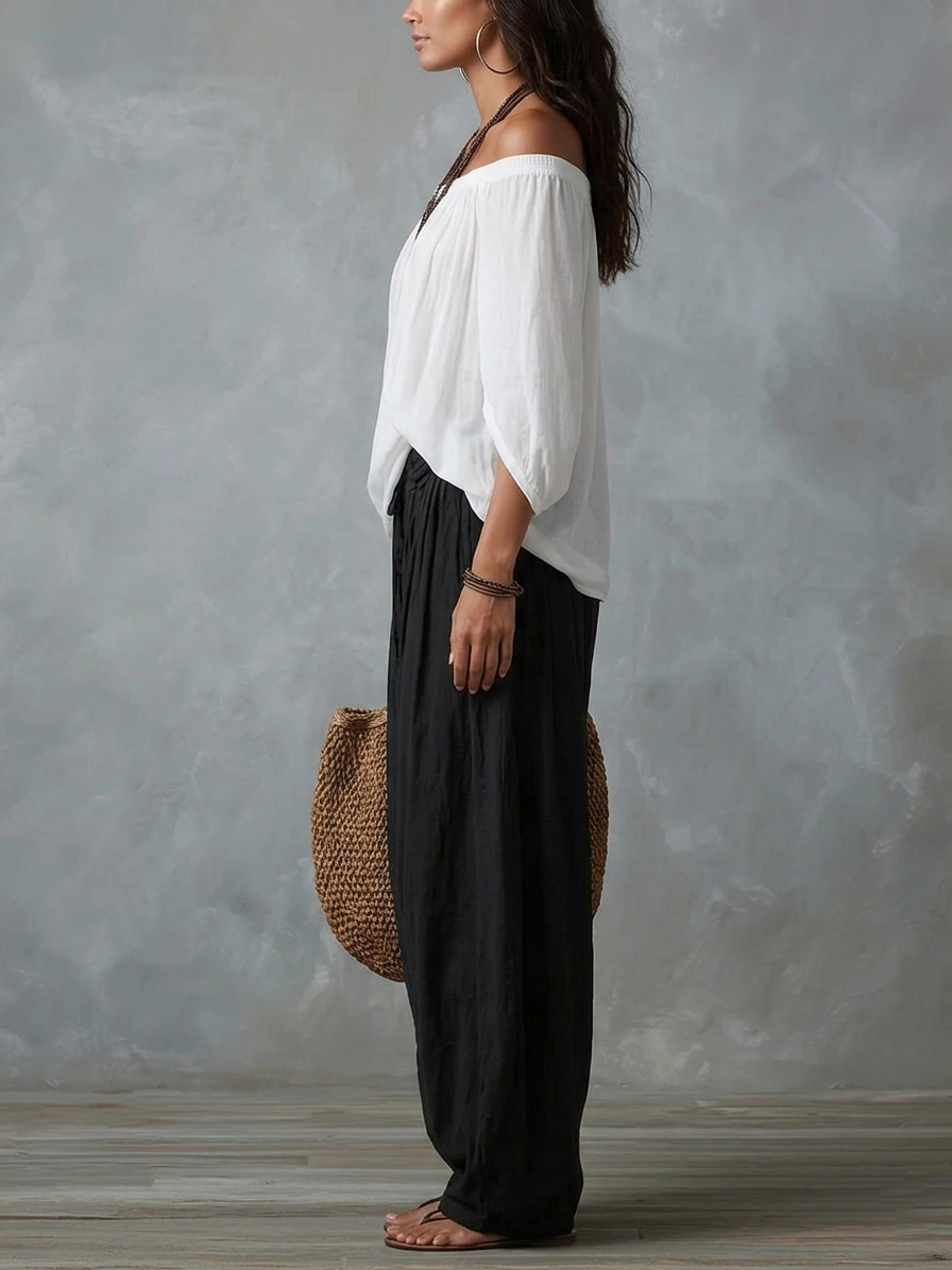 Manuela | Completo con top bianco a spalle scoperte e pantaloni larghi a lanterna