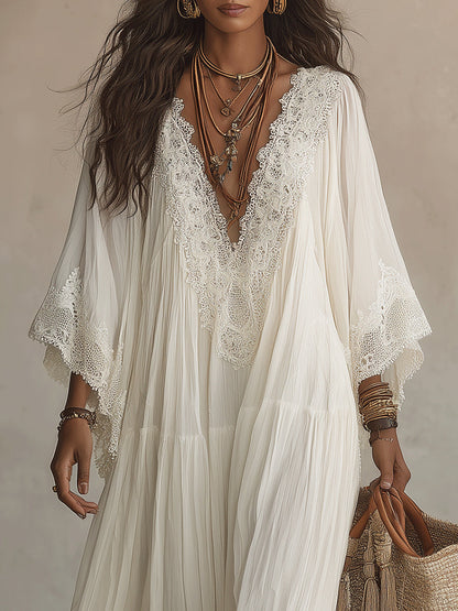 Serena | Abito lungo in chiffon bianco con scollo a V, maniche a pipistrello e pizzo bianco