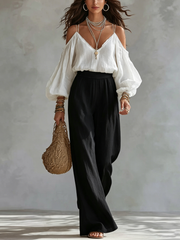 Andrea | Conjunto con top blanco de hombros descubiertos y pantalones negros palazzo