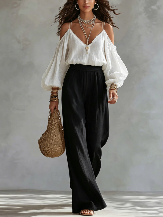 Andrea | Conjunto con top blanco de hombros descubiertos y pantalones negros palazzo