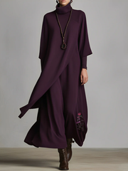Melina | Vestido maxi púrpura con cuello alto y pliegues asimétricos