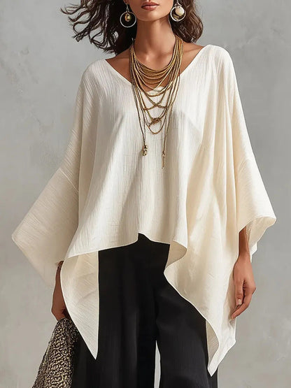 Top da donna in cotone-lino con scollo a V, maniche 3/4, taglio ampio e informale