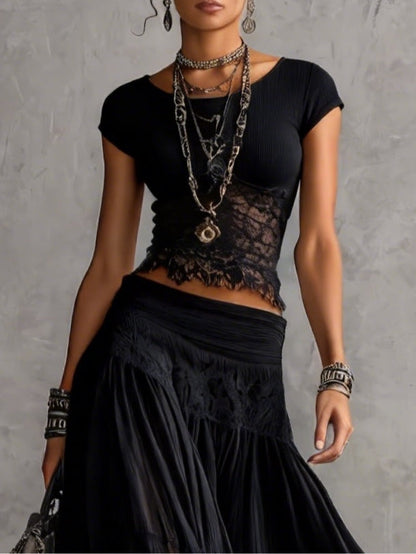 Ginevra | Set composto da top trasparente con pannelli in pizzo nero e gonna maxi plissettata